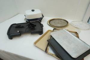 lot 156 image: Group of baking sheets, electric pan and griddle grill