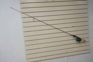 lot 229 image: Fishing Rod with green Gladdian reel