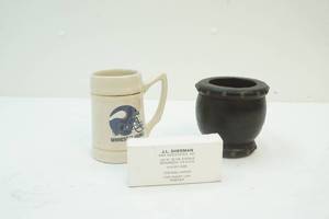 lot 239 image: Minnesota Vikings ceramic tavern mug, penholder, and thermal paper