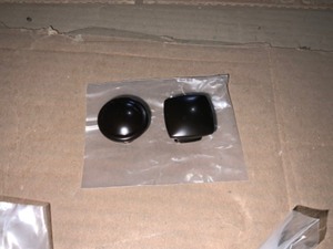 Two different shapes of Drawer pull knobs. One square and other round. Black and Bronze. See Pictures