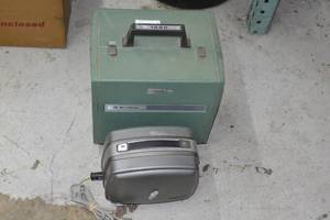 BELL AND HOWELL 1590 16MM Sound Projector & bolex 18-5l