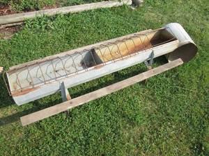 Vintage metal feeder and metal top...