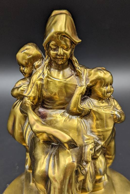lot 392 image: Colonial Mother Brass Bookend