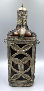 lot 182 image: Vintage Moroccan Oil Lamp Bottles