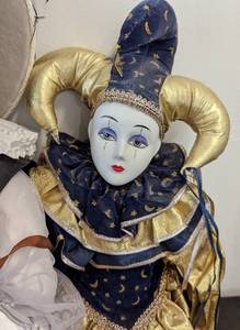 lot 147 image: Three Porcelain Jester Dolls