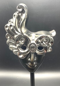 lot 307 image: Dramatic Porcelain Mask on a Wooden Base