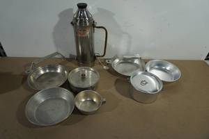lot 103 image: Uno-Vac Thermos and Metal Camping Cookware