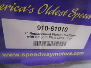 lot 102 image: (New) 7 Headlights & Chrome Cat Eyes