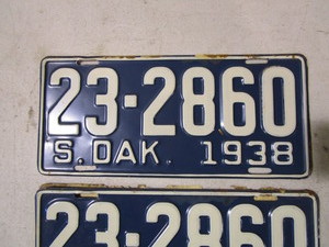 lot 229 image: Vintage License Plates wOriginal Envelope & Paper (never installed)