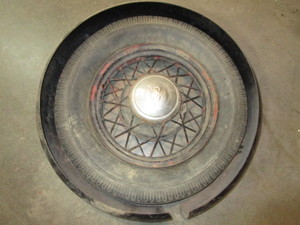 lot 389 image: 30s Ford Wheel & Spare Tire Ring
