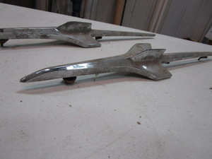 lot 393 image: 56 Chevy Fender Ornaments