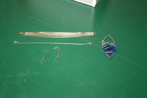 (2) Bracelets, (1) Pendant, (1 pair) Earrings
