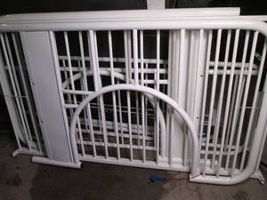 White tubular metal twin over full ...