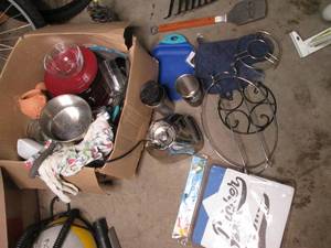 Box of random kitchenware. Trivets,...