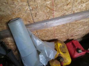 Roll of clear plastic sheeting (unk...