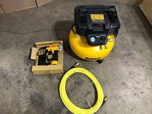 DEWALT 6 Gal. 18-Gauge Brad Nailer and Heavy-Duty Pancake Electric Air Compressor Combo Kit (1-Tool) Customer Returns See Terms on Auction