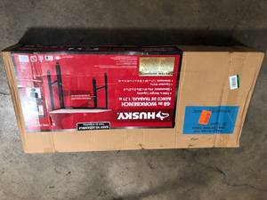 Husky 4 ft. Solid Wood Top Workbench in Black Customer Returns See Terms on Auction