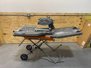 lot 26 image: RIDGID 10 in. Wet Tile Saw with Stand