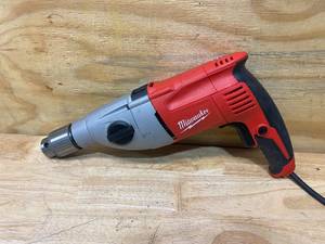 lot 27 image: MILWAUKEE 7.5 Amp Corded 12 in. Pistol Grip 2-Speed Hammer Drill
