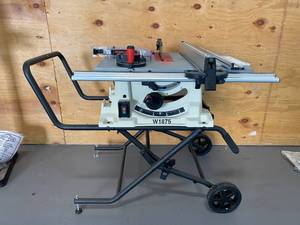 lot 25C image: SHOP FOX W1876 2 HP Benchtop Table Saw with Stand (MSRP $800)