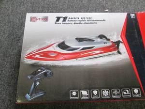 lot 77 image: Contixo Water Wizard T1 Remote Cont...