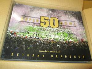 lot 124 image: pallet of super bowl 50 soft cover ...