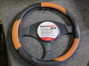 lot 147 image: 11 new autocraft steering wheel cov...