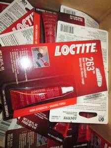 lot 150 image: box of new loctite 263 red threadlo...
