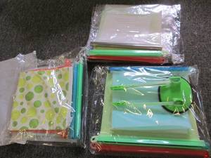 lot 234 image: 3 packages of new silicone storage ...