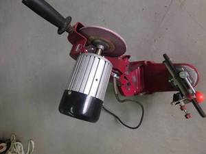 Electric chain saw chain sharpener