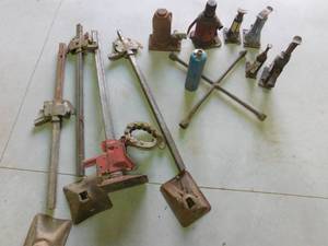 10 car jacks, torch propane tank and 4 way tire iron
