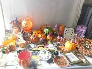 2 boxes of halloween and fall decorations