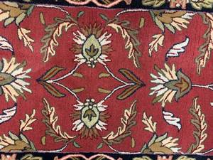 lot 207 image: Hand Tufted Wool Rug with Elegant Design