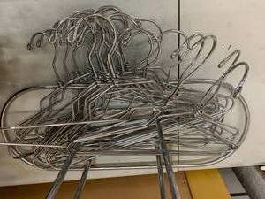 lot 217 image: Chrome hanger rack with hangers, basket of different wood and metal hangers