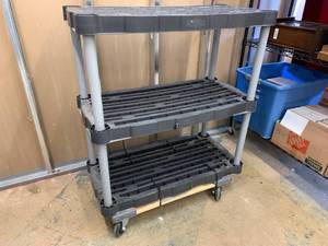 lot 313 image: Rubbermaid Plastic Shelving on Moving Dolly