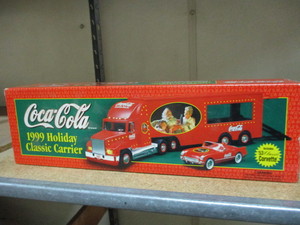 lot 12 image: 1999 Coke Holiday Carrier Die cast Truck