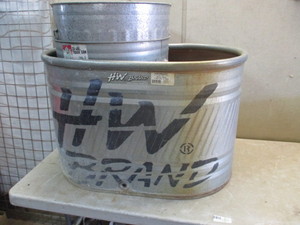 lot 75 image: 50 Gallon Water Tank and 2 30 gallon trash cans