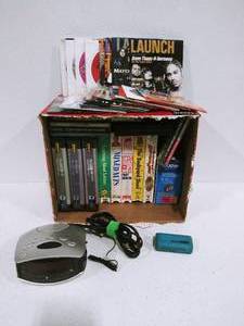 lot 14 image: CDs, PC Games,VHS Tapes, Alarm Clock and Printer Ink