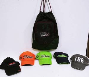 lot 31 image: Under Armour Bag & Hats Titleist