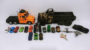 lot 34 image: Hot Wheels, Planes and Big Boy Trucks