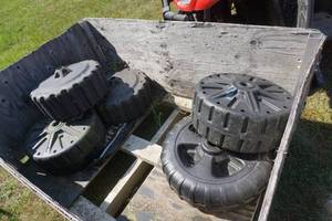 lot 60 image: 5 Plastic DockBoat Lift Wheels