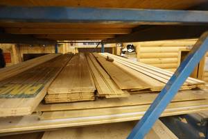 lot 21 image: Lot of Knotty Pine and Assorted Boards