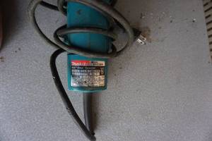 lot 103 image: Makita Model M9503BH 4 12 Disc Grinder