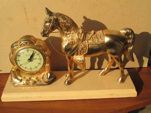 lot 188 image: Horse clock in metal...