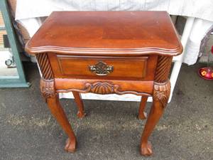 lot 7 image: Ornate side table 20 wide 30 tall...