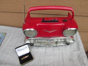 lot 24 image: 57 Chevy radio...