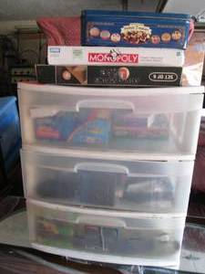 lot 34 image: Plastic chest filled with games, Hi...