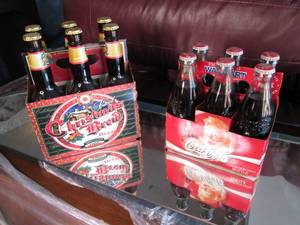 lot 36 image: Collector Coca Cola bottles...
