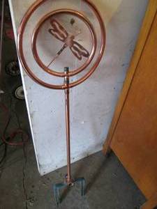 lot 42 image: Copper garden decor...