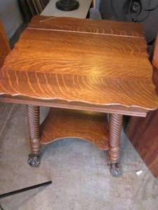 lot 53 image: Ornate antique table with glass fee...
